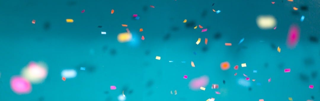 selective focus photography of multicolored confetti lot selective focus photography of multicolored confetti lot