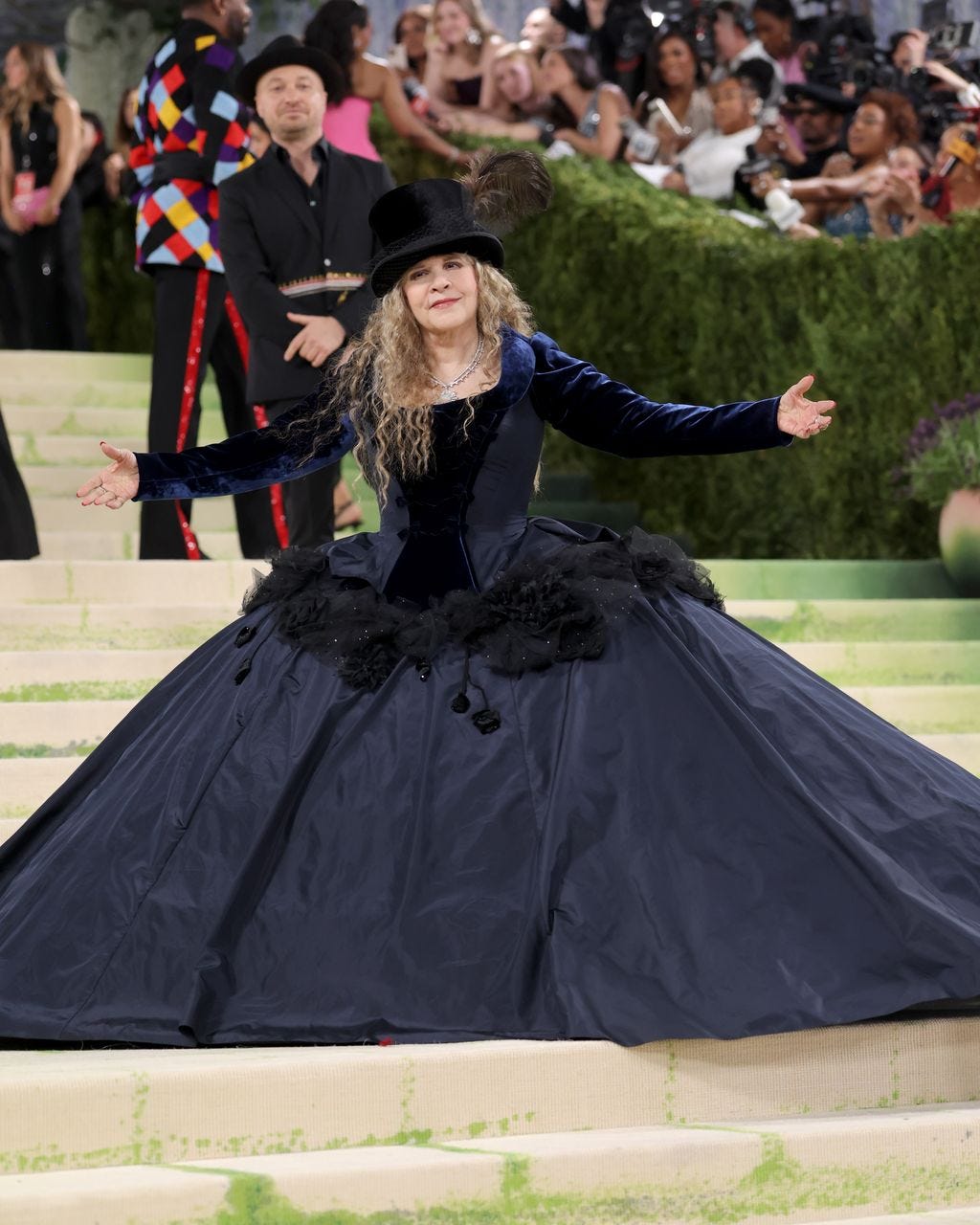 Image may contain Stevie Nicks Kyla Ross Person Adult Clothing Dress Formal Wear Accessories Jewelry and Necklace