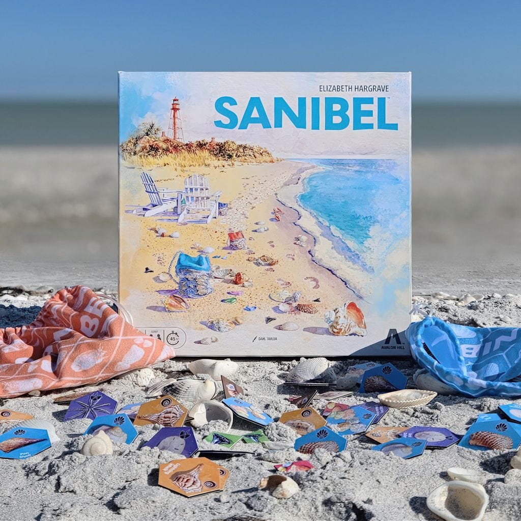 Sanibel — box and tiles displayed on the beach, with actual shells