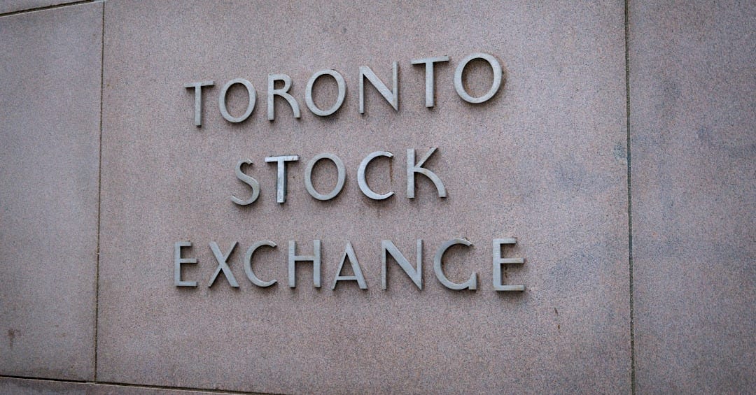 a sign on the side of a building that says toronto stock exchange