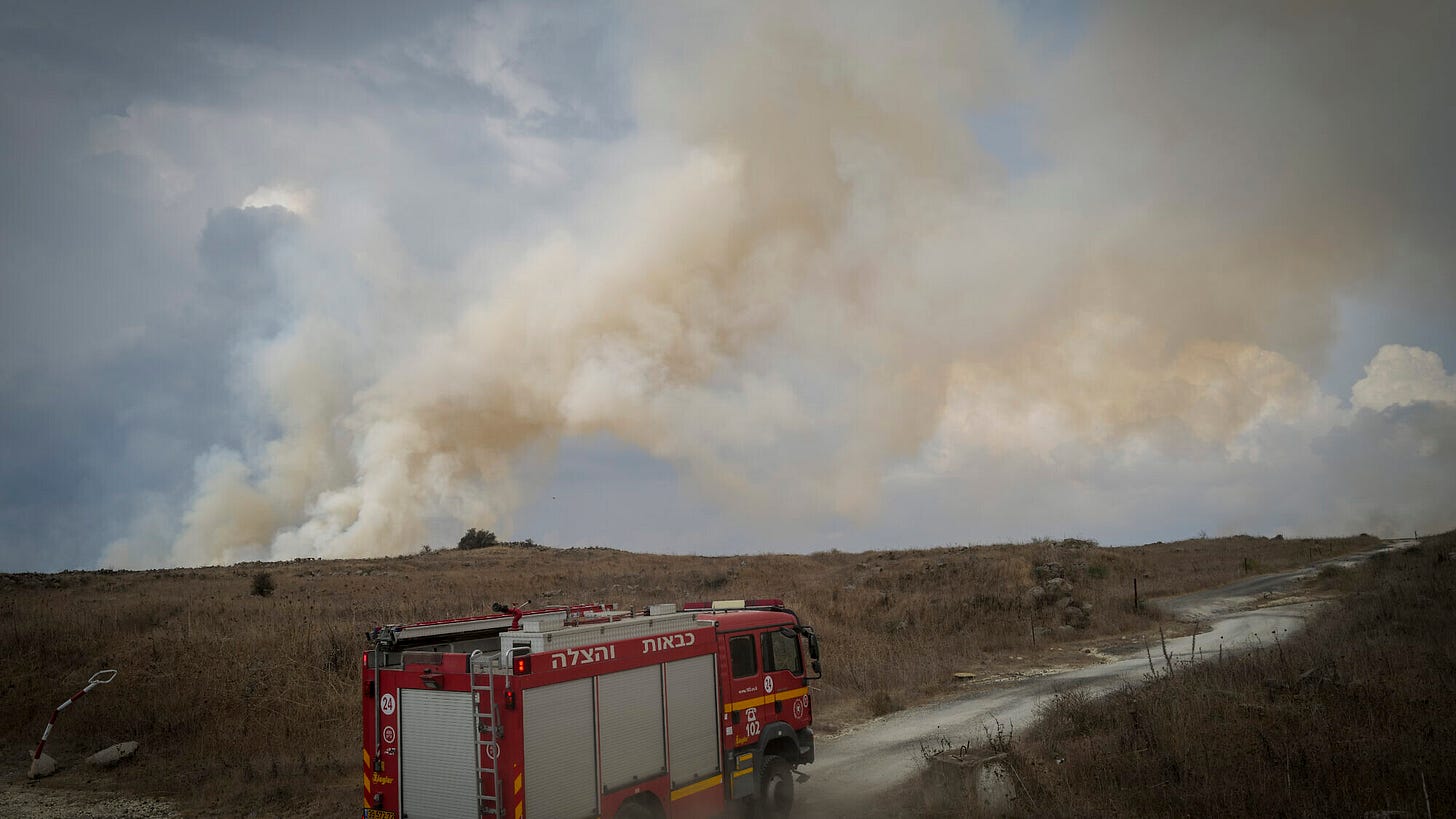 Firefighters combat wildfires following a 25-missile barrage on the northern town of Katzrin and central Golan Heights, Nov. 3, 2024. Photo by Michael Giladi/ Flash90. Firefighters combat wildfires following a 25-missile barrage on the northern town of Katzrin and central Golan Heights, Nov. 3, 2024. Photo by Michael Giladi/ Flash90.