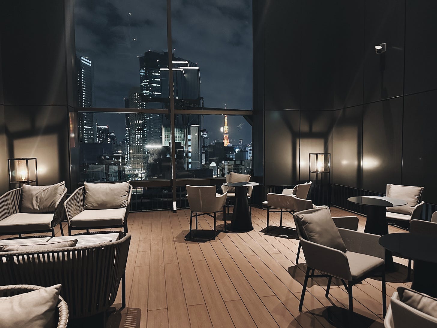 Evening views of Tokyo tower from the floor-to-ceiling windows on the AC Ginza Hotel rooftop. Evening views of Tokyo tower from the floor-to-ceiling windows on the AC Ginza Hotel rooftop.