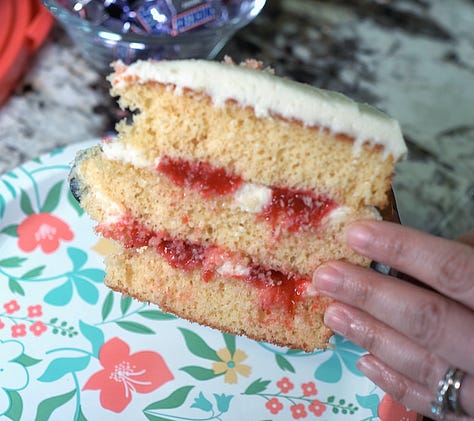 Naked 3-layer yellow cake with strawberry filling + cream cheese frosting