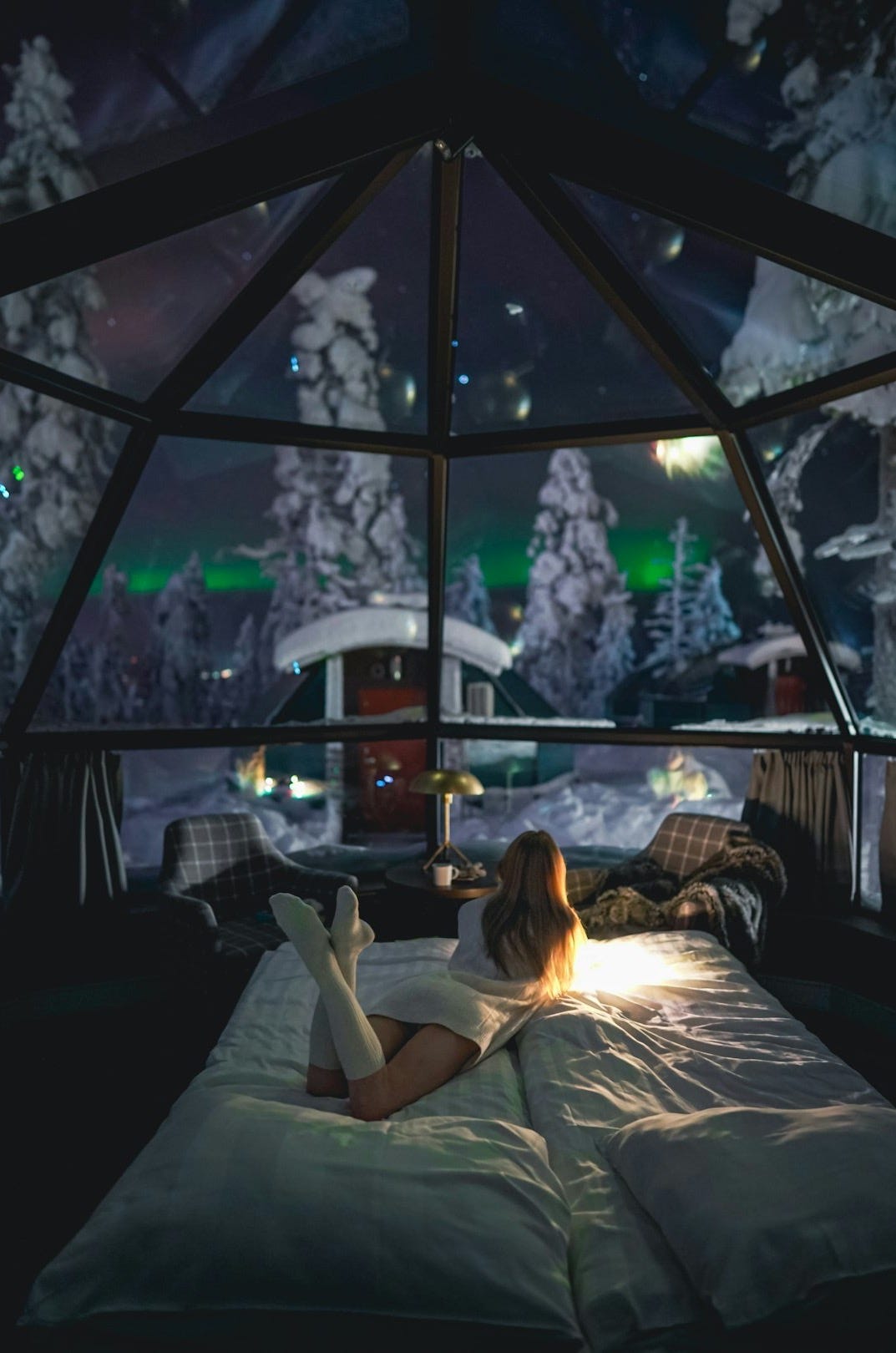 a person sitting on a bed a person sitting on a bed
