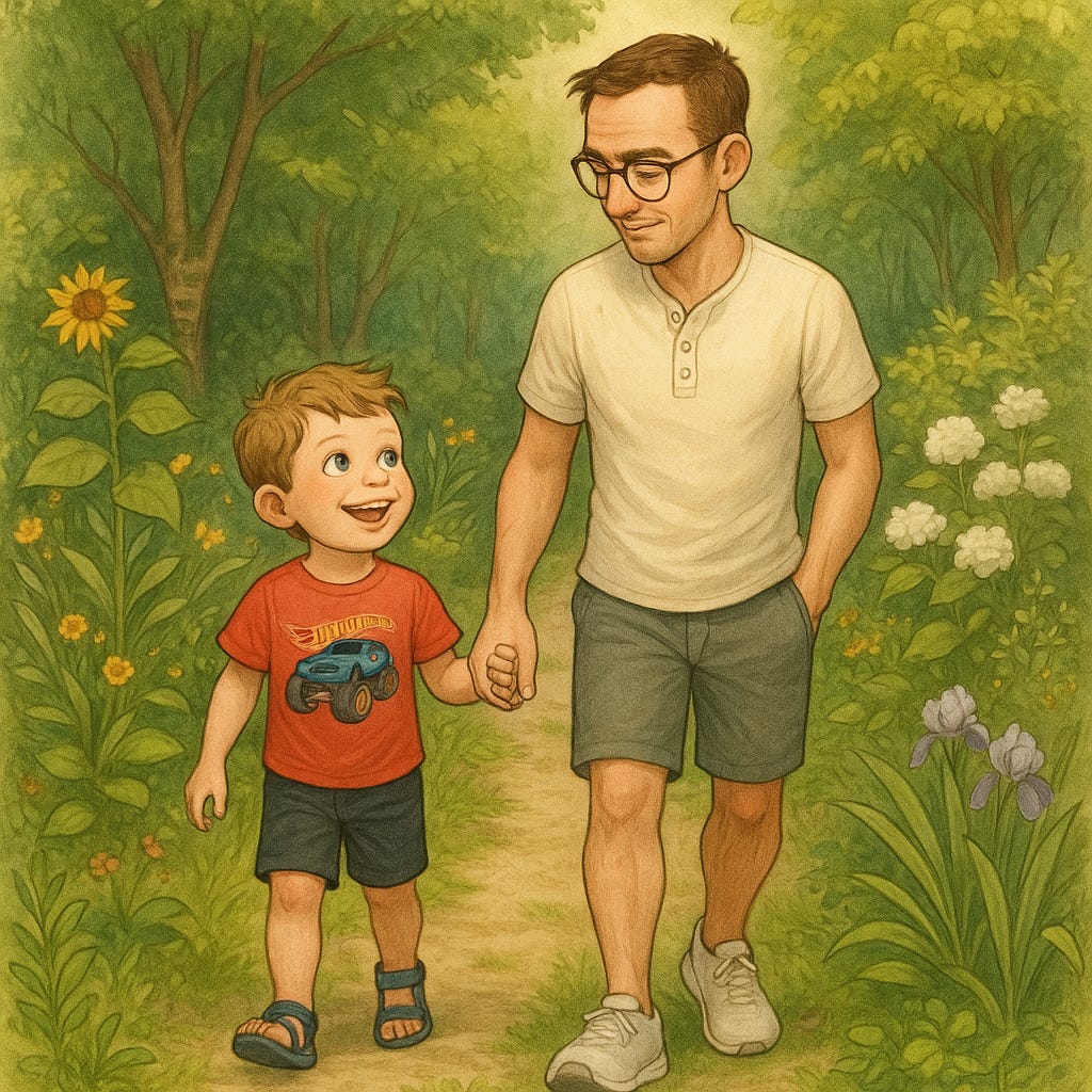 Father and young son walk hand-in-hand on a garden path surrounded by trees and flowers.