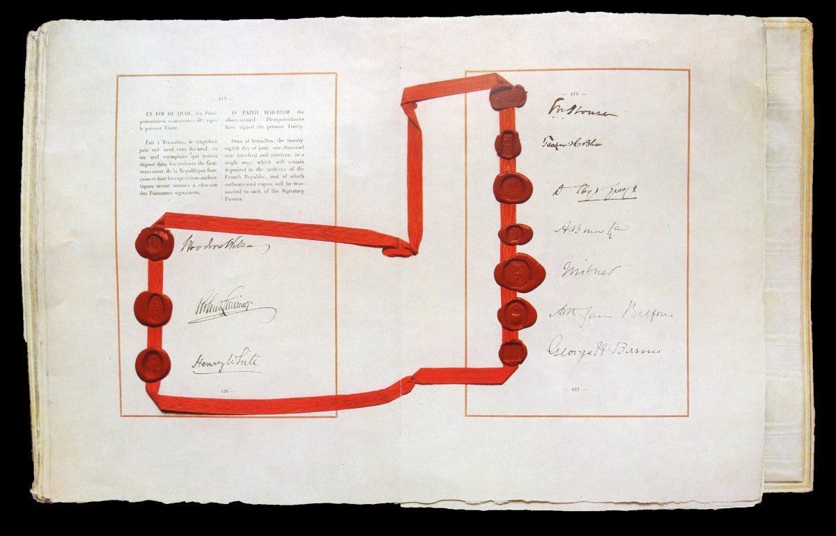 Treaty of Versailles with signatures of Lloyd George, Woodrow Wilson, Andrew Bonar Law and James Balfour. 