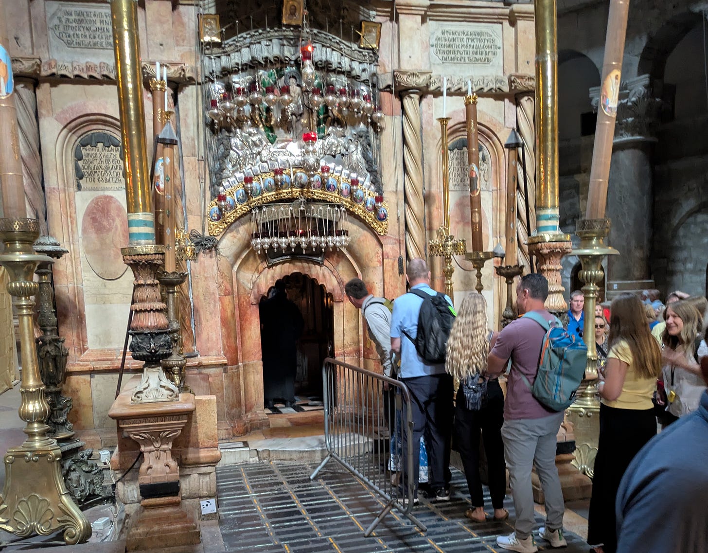 Short line of people waiting to enter the purported tomb at the Church of the Holy Supulchre. Short line of people waiting to enter the purported tomb at the Church of the Holy Supulchre.