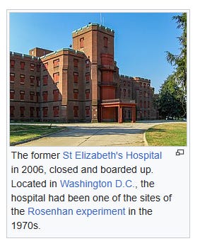 Text reads: The former St. Elizabeth's Hospital in 2006, closed and boarded up. Located in Washington D.C., the hospital had been one of the sites of the Rosenhan experiment in the 1970s.