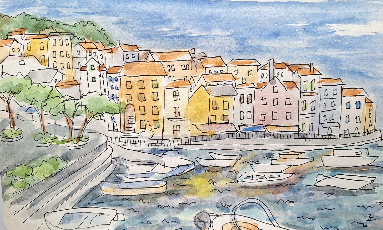 Pen an ink and watercolour sketch of a village harbour.  Colourful houses with contrasting shutters and red roofs.  Small white boats bobbing in the foreground.