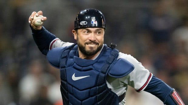 The Angels signed veteran catcher Travis d’Arnaud, pictured, because they believe the 35-year-old can still be productive – his .739 OPS last season was above average for a major league catcher – but also because of how they believe he can impact young catcher Logan O’Hoppe and the Angels’ young pitchers. (AP Photo/Kyusung Gong)
