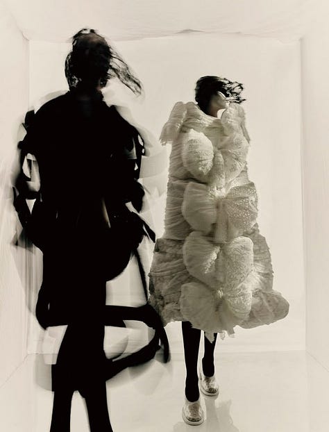 Left to right: Comme des Garçons Fall/Winter 1997 (Body Meets Dress, Dress Meets Body), Spring/Summer 2018 (sculptural florals), and Fall/Winter 2012 (flat form silhouettes), each exemplifying Rei Kawakubo’s ongoing interrogation of volume, distortion, and the limits of fashion as a wearable medium.