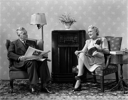 Old fashioned people listening radio Stock Photos - Page 1 : Masterfile