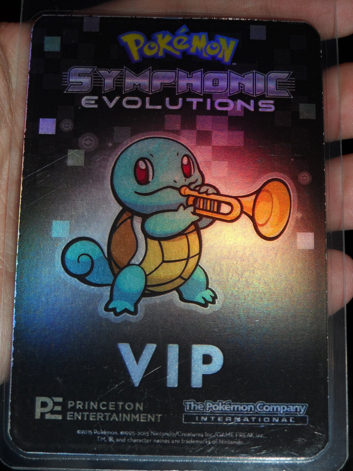 A photograph of my VIP badge, featuring Squirtle