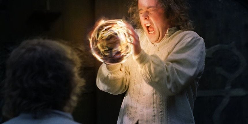 Pippin screaming while holding the Palantir in Lord of the Rings.