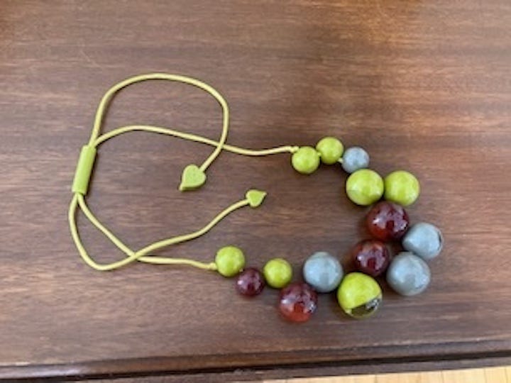 beaded necklace in green blue and purple beaded necklace in green blue and purple