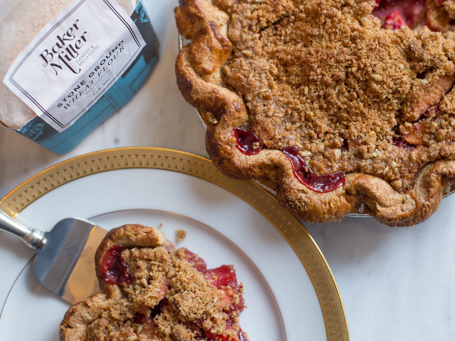 Photo of a sliced pie and a bag of flour
