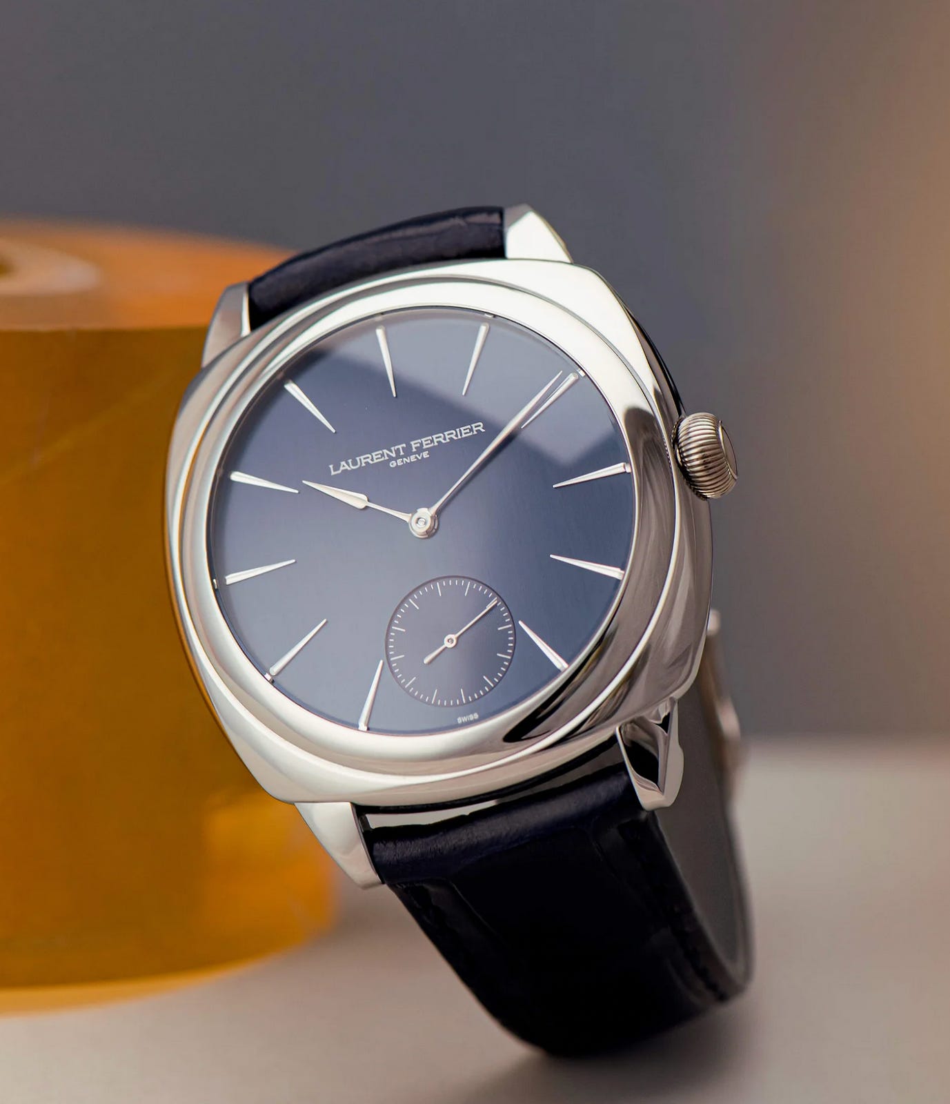 A Laurent Ferrier Square Micro-Rotor Blue with a 41mm stainless steel case, cushion-shaped case, sunburst blue dial, Assegai-shaped hands, and a micro-rotor movement, offering refined elegance and technical mastery. A Laurent Ferrier Square Micro-Rotor Blue with a 41mm stainless steel case, cushion-shaped case, sunburst blue dial, Assegai-shaped hands, and a micro-rotor movement, offering refined elegance and technical mastery.