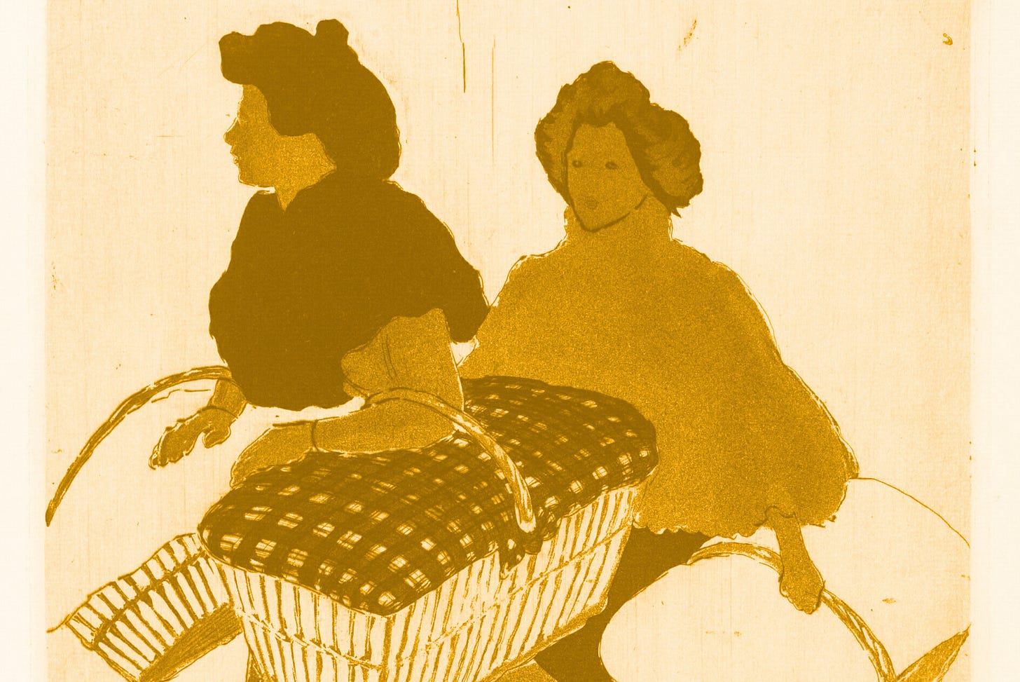 Two friends folding laundry together and laughing
