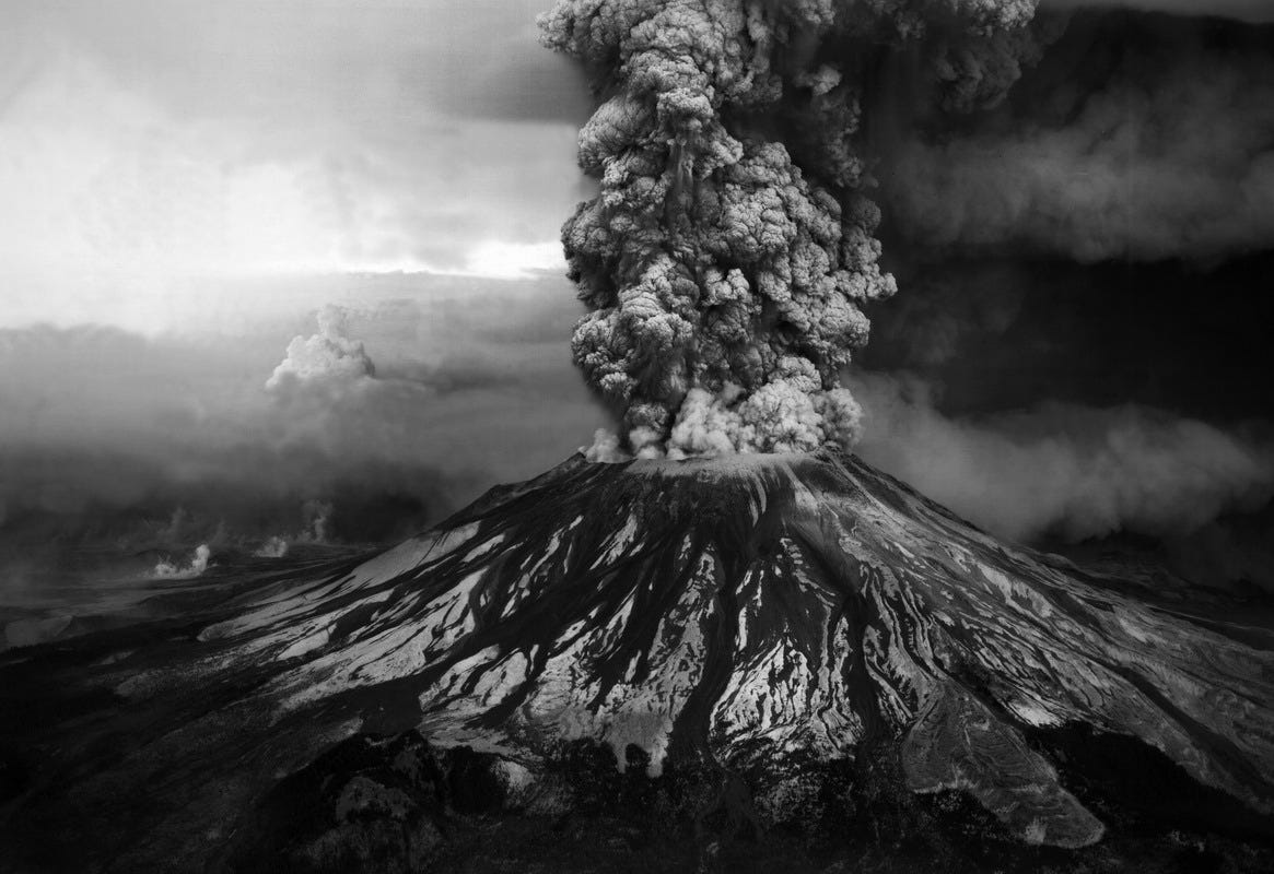 Black-and-white image of smoke and ash pouring from Mount St. Helens as it erupted. Black-and-white image of smoke and ash pouring from Mount St. Helens as it erupted.
