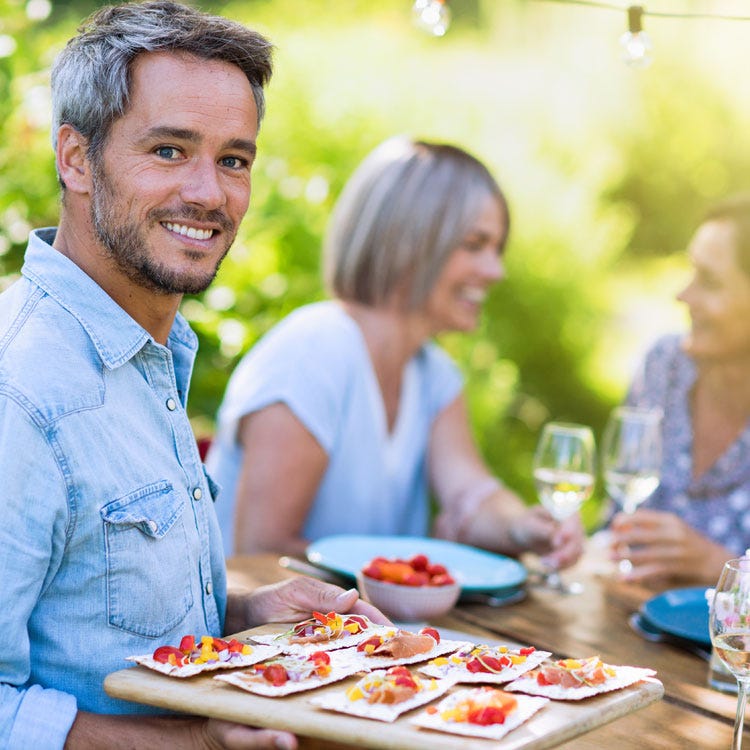 Host serving tapas instead of pizza to illustrate the writer giving the reader what they want.