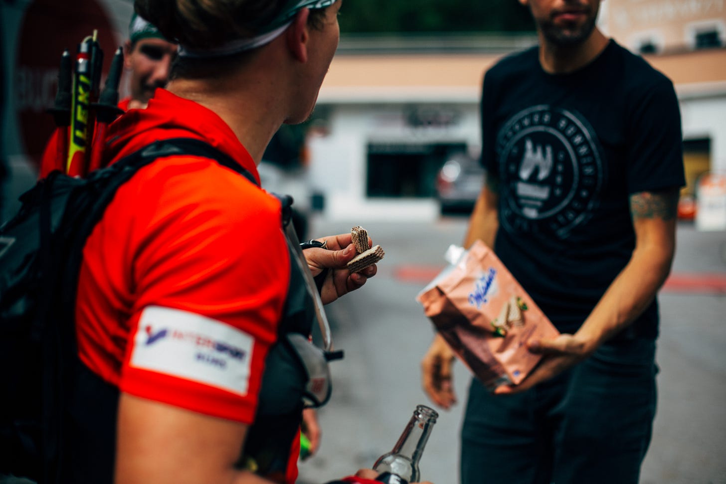 The author serving a friend Manner Waffeln at the Transalpine Run