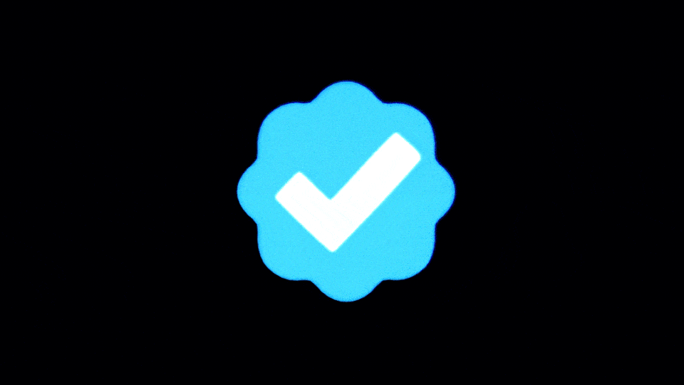 A twitter blue checkmark, melting