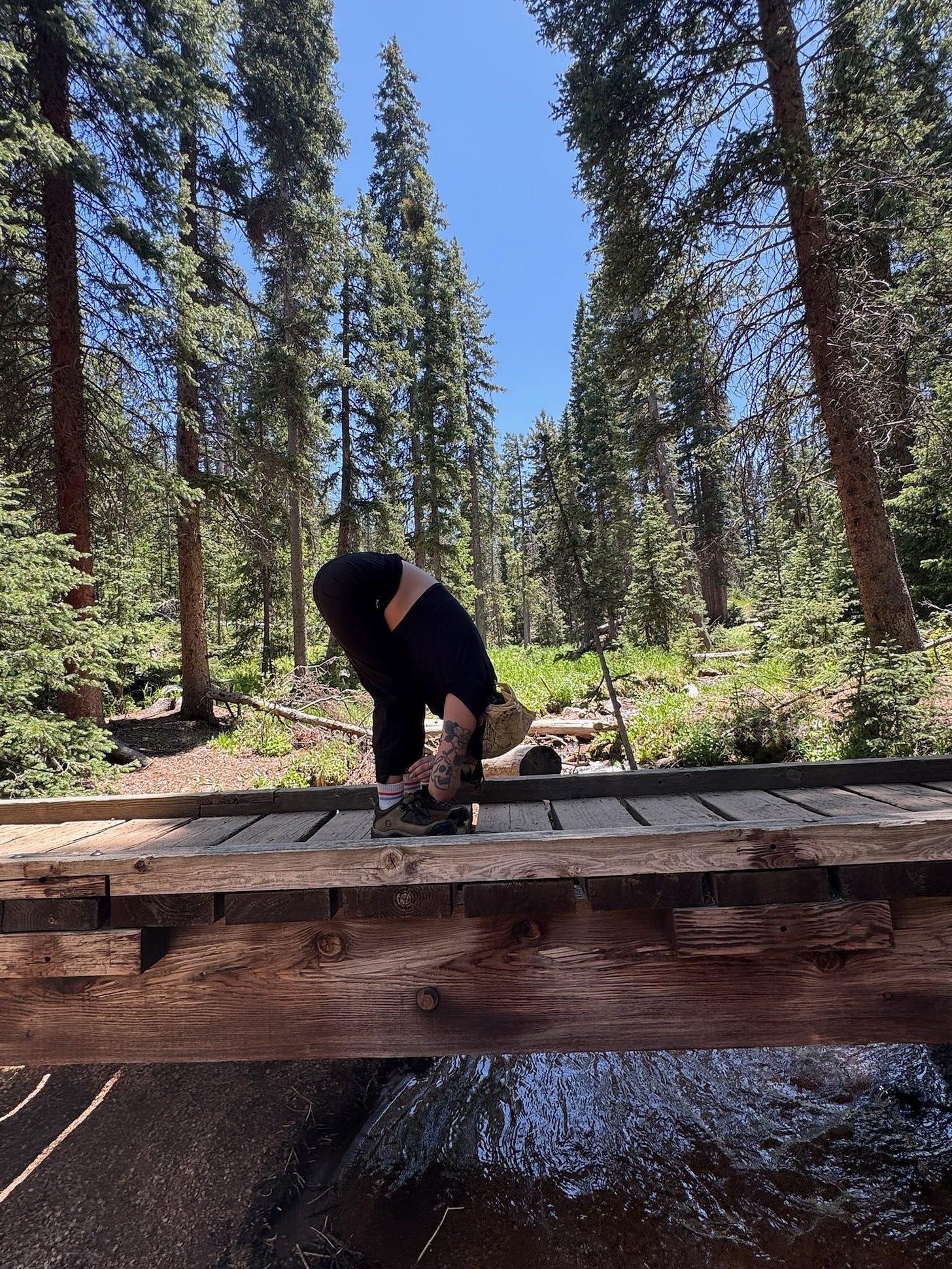 May be an image of 1 person and practicing yoga