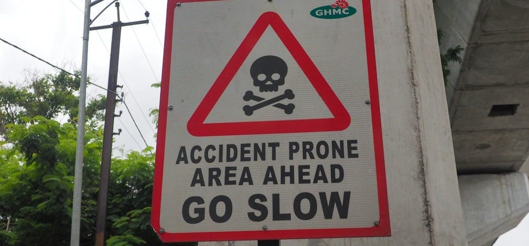 accident prone area ahead go slow signage accident prone area ahead go slow signage