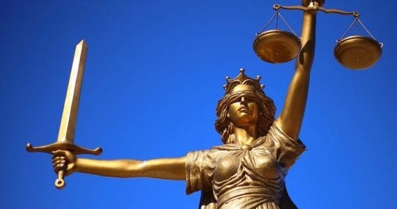 Lady Justice depicting the notion justice is blind and equal