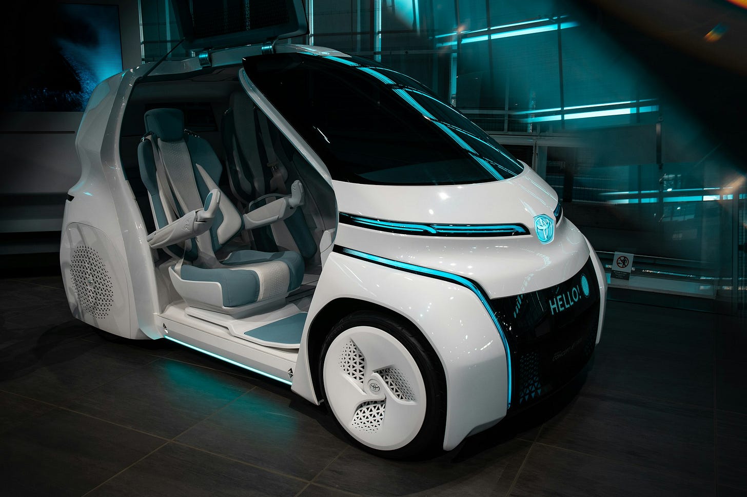 Toyota displays its new car concept at an exhibition about future mobility, electric and fuell cell cars Toyota displays its new car concept at an exhibition about future mobility, electric and fuell cell cars