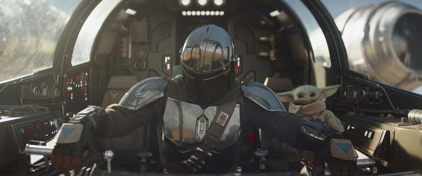 The Mandalorian and Grogu in the Razor Crest. The Mandalorian and Grogu in the Razor Crest.