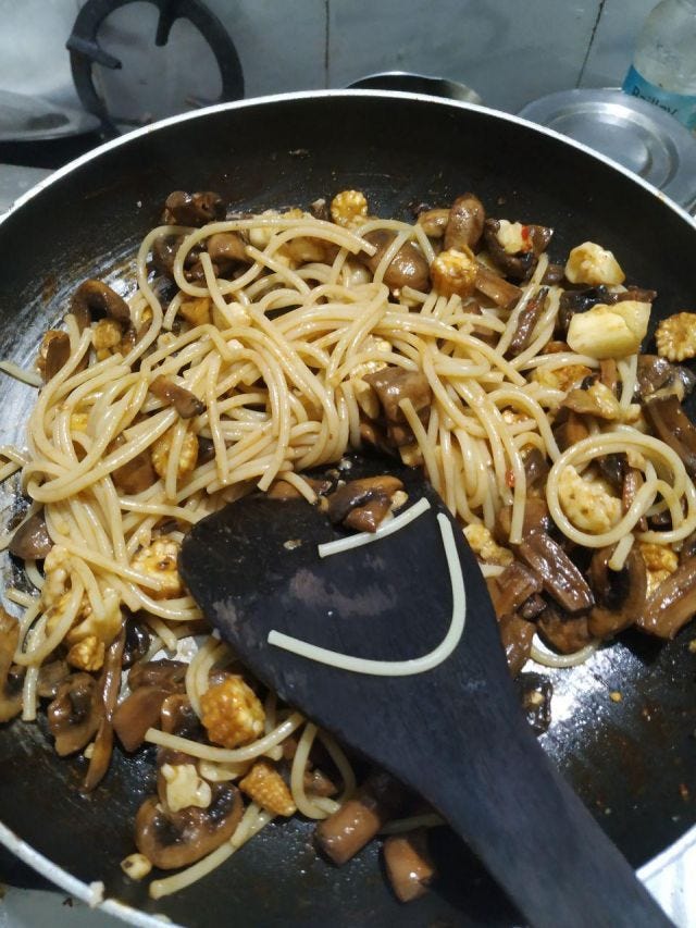 Noodles with mushrooms and babycorn and cheese. Noodles with mushrooms and babycorn and cheese.