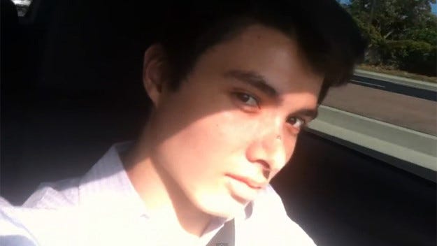 Elliot Rodger staring into the camera in his car
