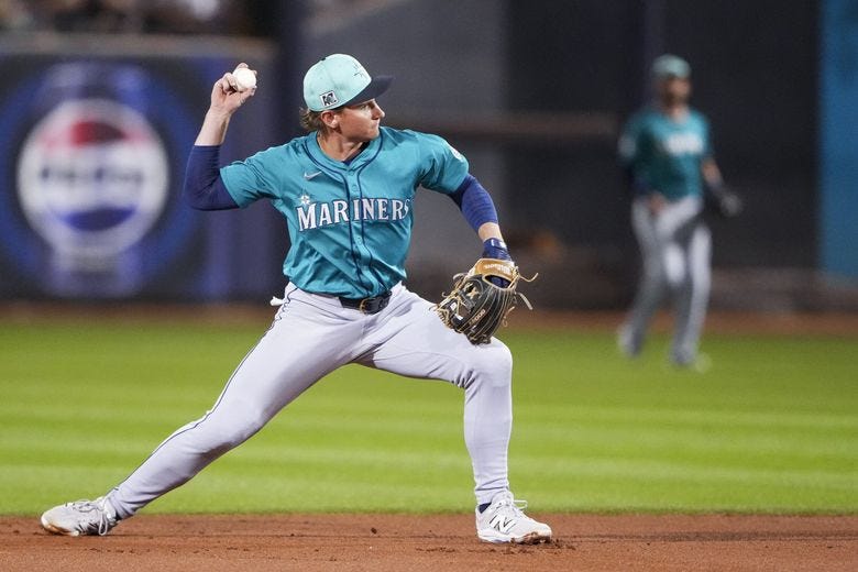 Mariners shortstop Colt Emerson throws to first base during a spring training game against the Padres on Feb. 28, 2025, in Peoria, Ariz. (Lindsey Wasson / The Associated Press) Mariners shortstop Colt Emerson throws to first base during a spring training game against the Padres on Feb. 28, 2025, in Peoria, Ariz. (Lindsey Wasson / The Associated Press)