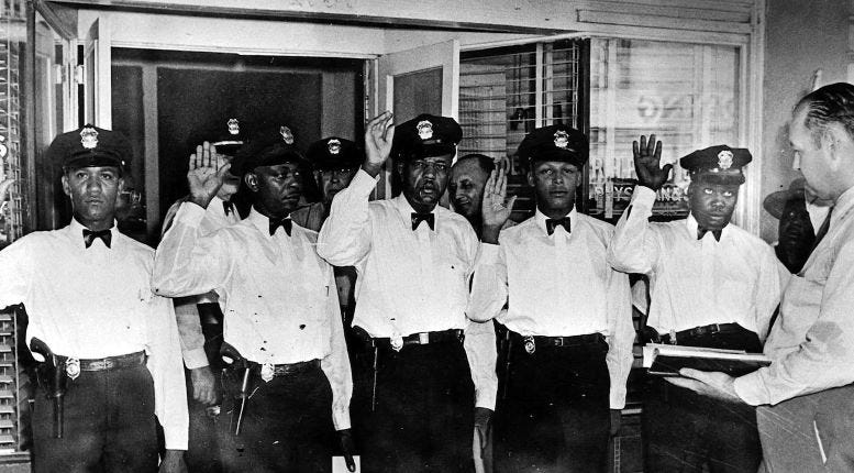 The first five black officers sworn in on September 1, 1944. From left to right, the men were Ralph White, John Milledge, Clyde Lee, Edward Kimble, and Moody Hall. Courtesy of the Historical Black Precinct and Courthouse Museum. The first five black officers sworn in on September 1, 1944. From left to right, the men were Ralph White, John Milledge, Clyde Lee, Edward Kimble, and Moody Hall. Courtesy of the Historical Black Precinct and Courthouse Museum.