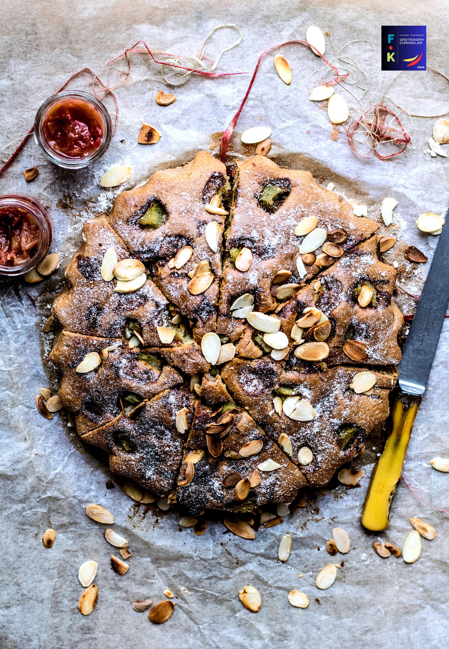 baked cake next to knife and dip sauces
