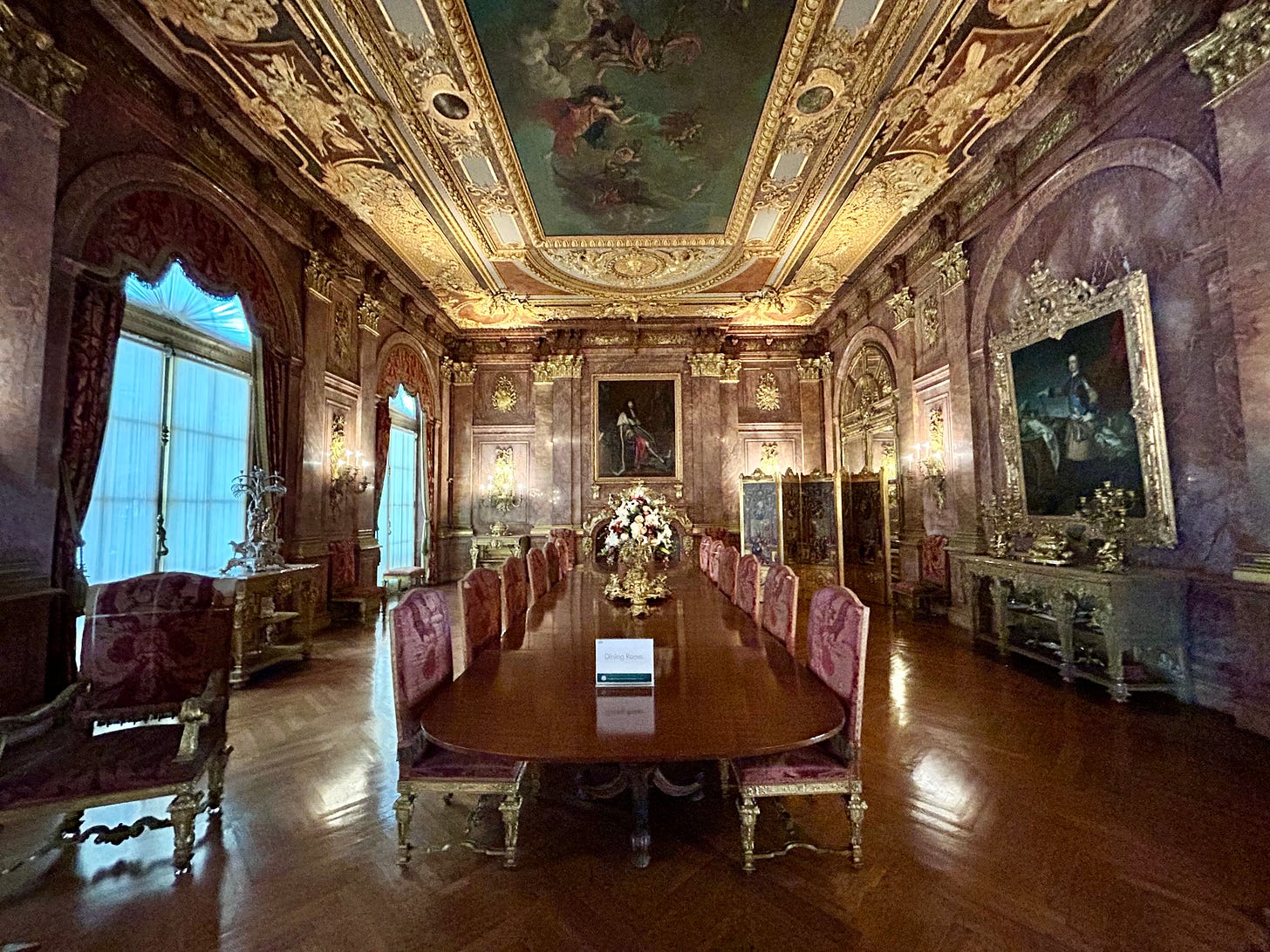 dining room, table, chairs, curtains, drapes, art, high ceilings