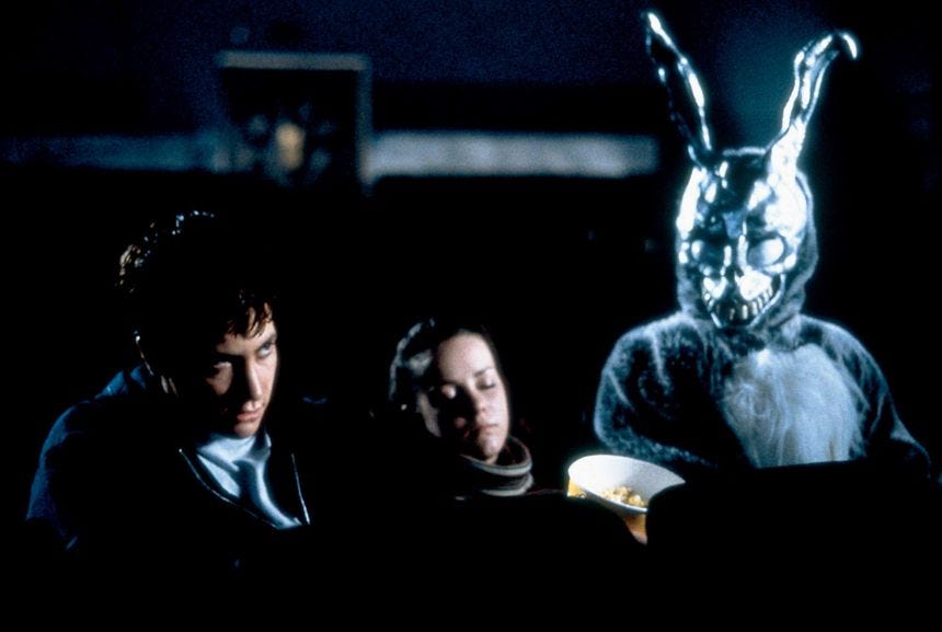 Jake Gyllenhaal, Jena Malone and Frank the Rabbit in 'Donnie Darko'