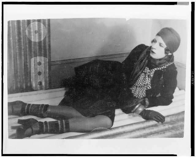 Nancy Cunard,lying,leaning,elbow,writer,heiress,political  activist,London,1930