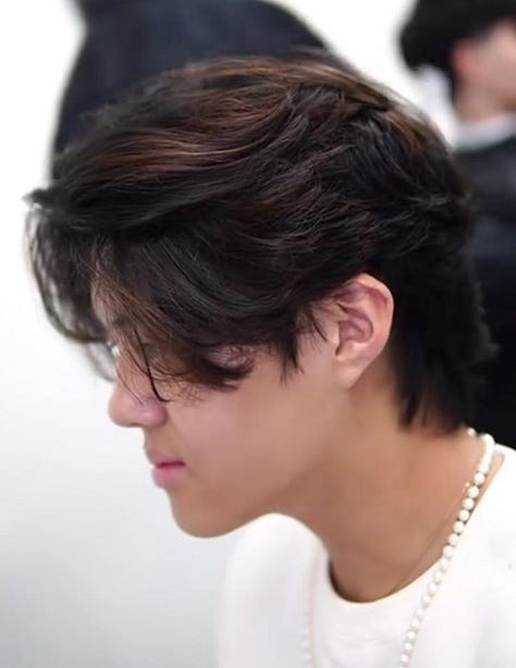 Modern curly mullet, 90s Winona Ryder and modern floppy haircuts.
