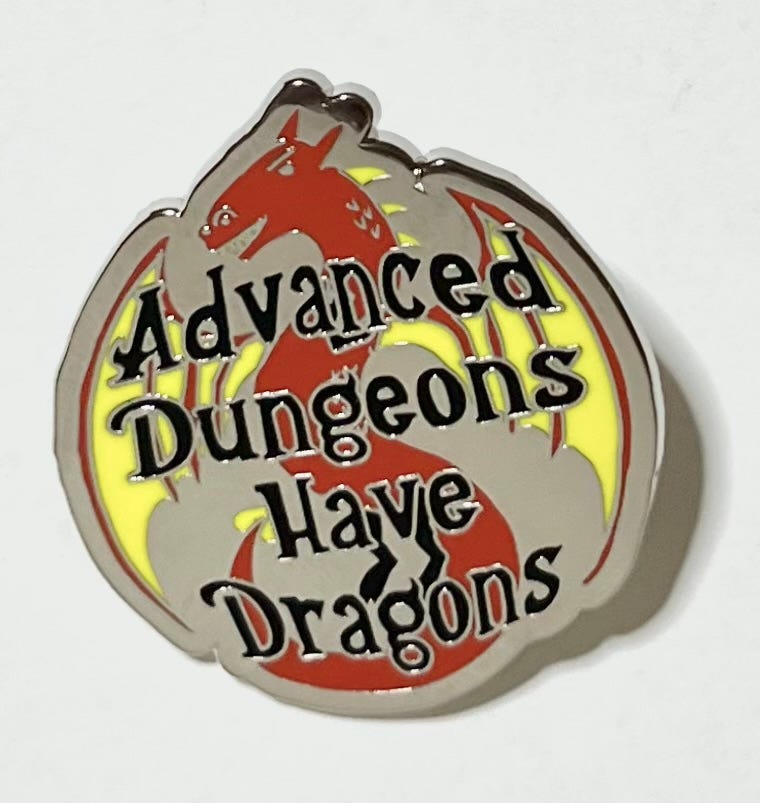 Image of the Advanced Dungeons Have Dragons enamel pin.