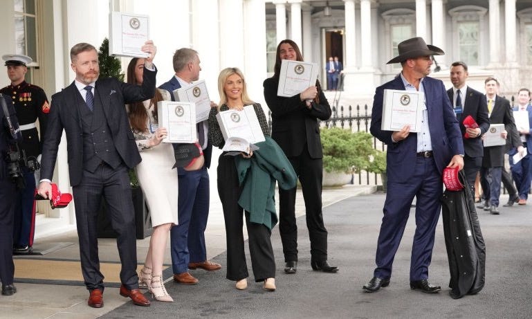 Conservative political influencers hold binders with information on Jeffrey Epstein outside the West Wing of the White House in Washington, D.C. on Thursday. Photo by Chris Kleponis/UPI Conservative political influencers hold binders with information on Jeffrey Epstein outside the West Wing of the White House in Washington, D.C. on Thursday. Photo by Chris Kleponis/UPI