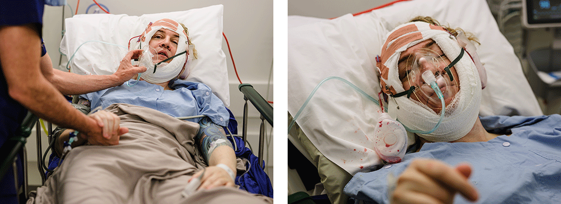 [Wrapped in gauze, clutching the doctors hand]