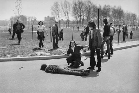 A group of people on the street

AI-generated content may be incorrect.