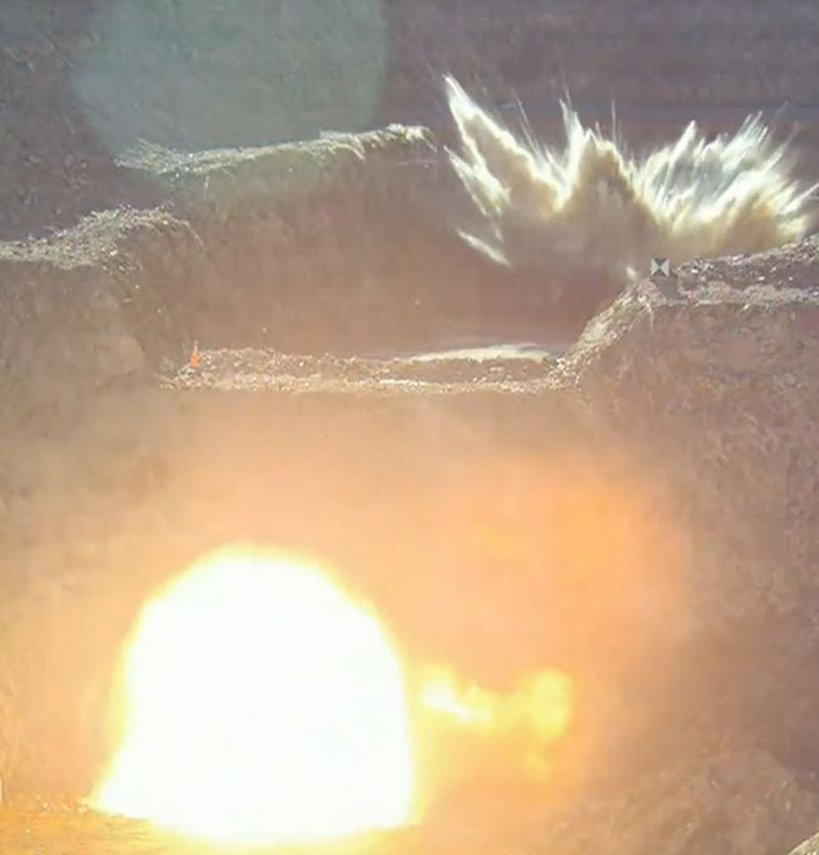Controlled explosion in a quarry.