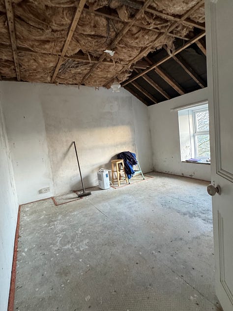 Three images of a bedroom in stages as it gets cleared and then the ceilings and carpets removed