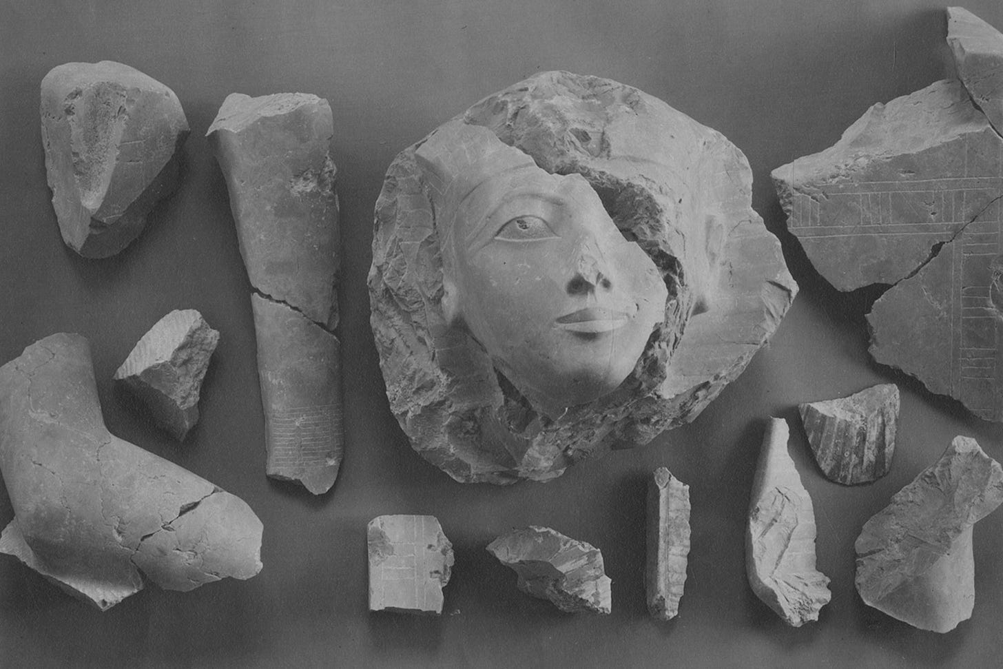 Fragments of a limestone statue of Hatshepsut.
