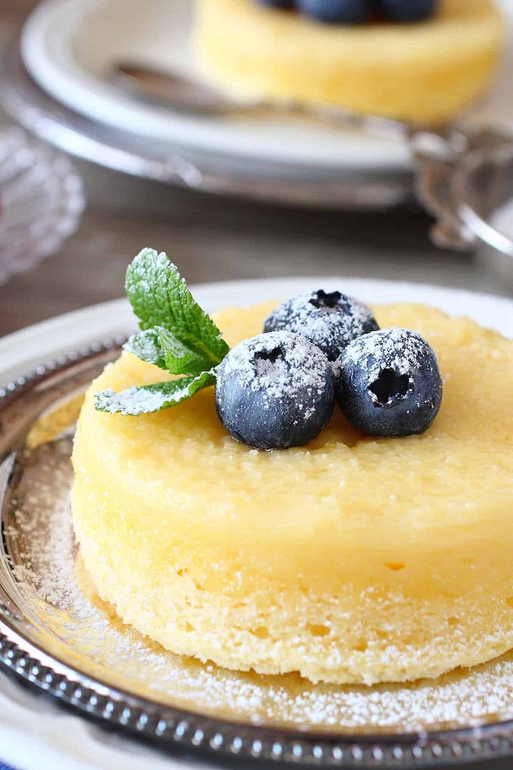 Easy spring desserts including a berry trifle, pudding cakes, strawberry bread, and bakewell tart.