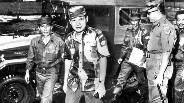 A group of men in military uniforms

Description automatically generated with low confidence