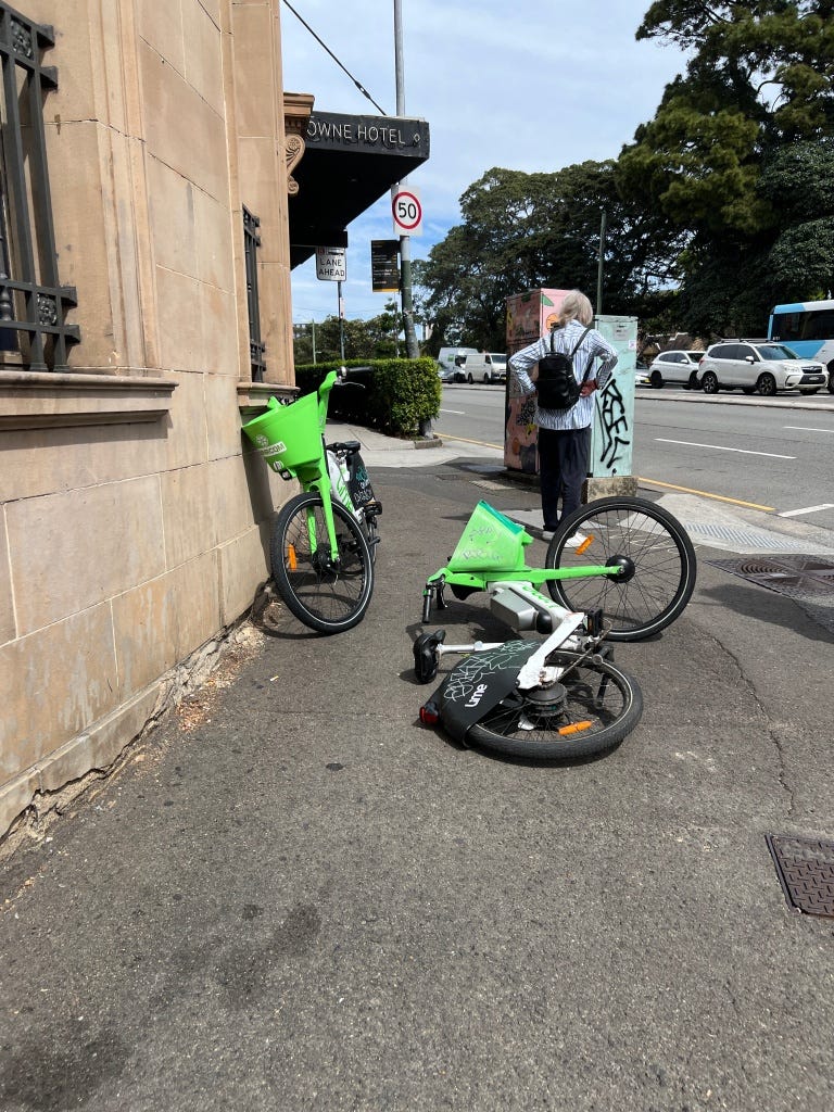 Chippendale, fallen Lime bike across the footpath.